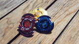Jawas Junkyard Egyptian God Bey Trio Pack: Ra, Obelisk, and Slifer custom metal Beys in red, blue, and gold finishes with gemstone details.